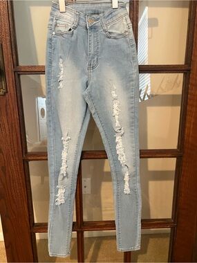 Women's Light Blue High-Rise Distressed Skinny Jeans